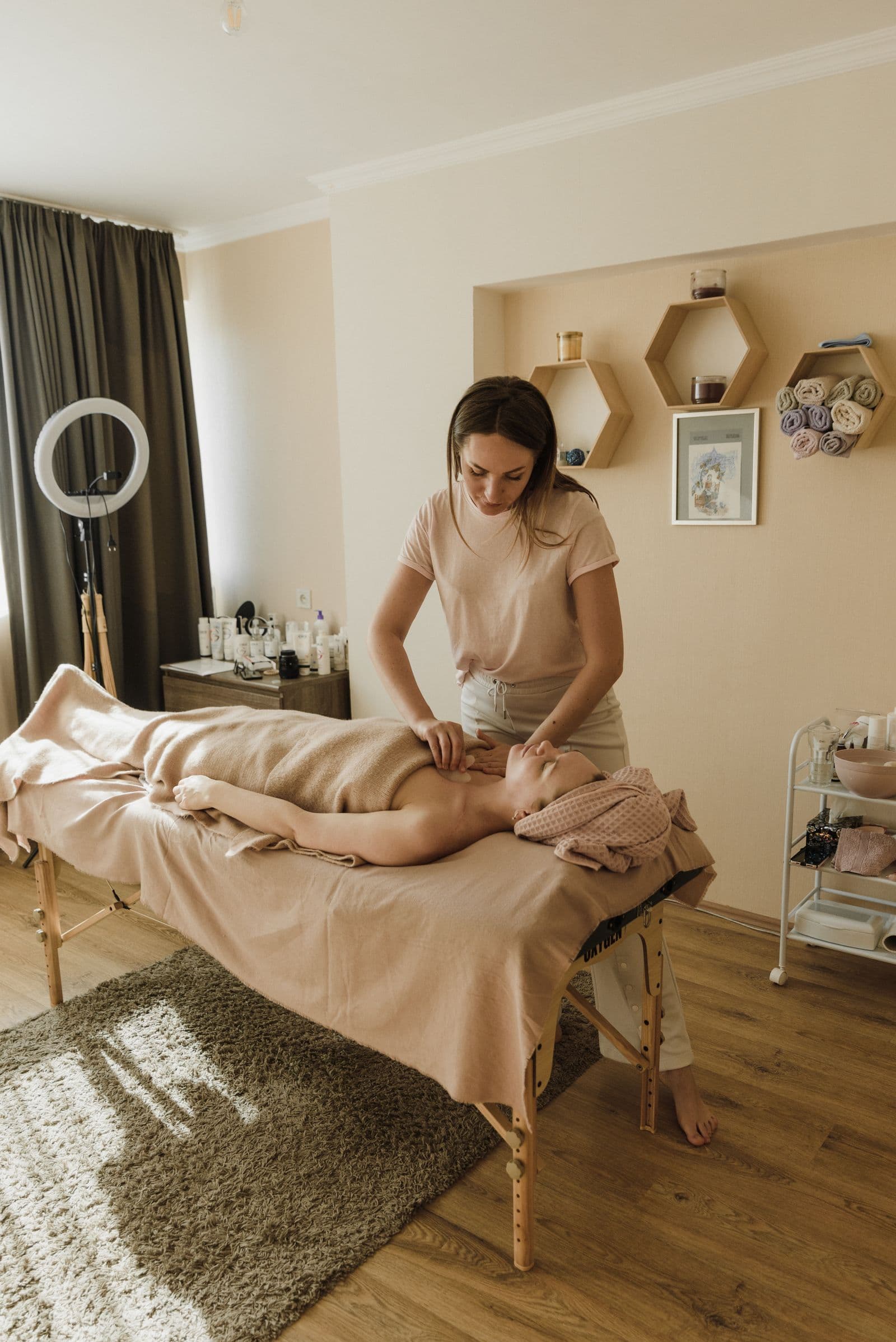 A calming treatment underway in a warm, private spa room