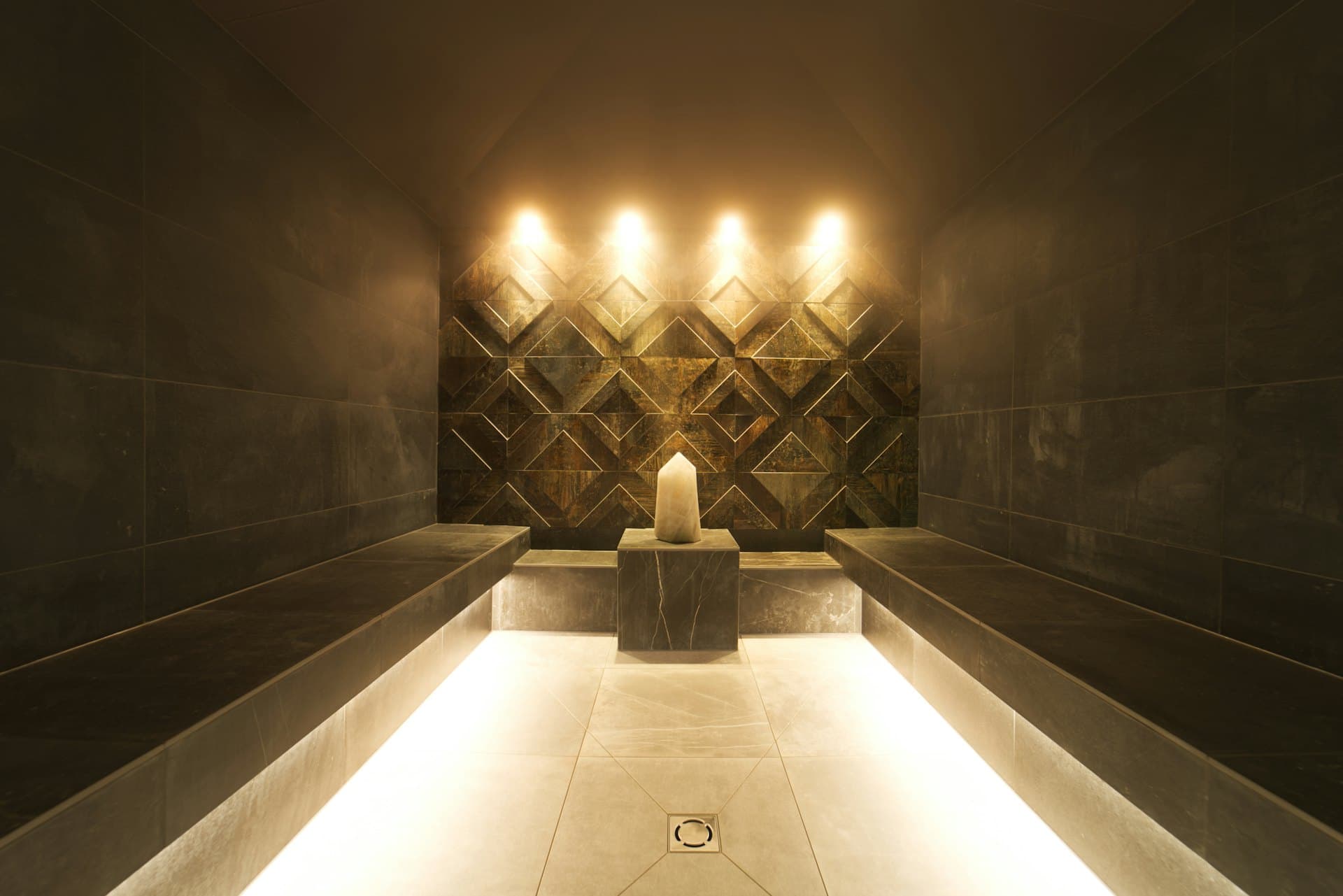 Warmly lit treatment space at Healing Asian Spa